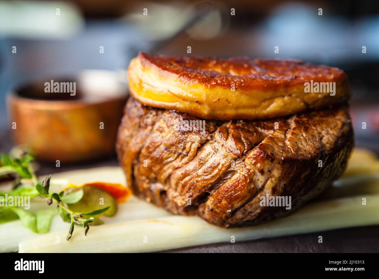 Tournedos Rossini. Foie gras, Black Angus beef tenderloin, white asparagus,  red wine sauce. Delicious healthy traditional food closeup served for lunc  Stock Photo - Alamy