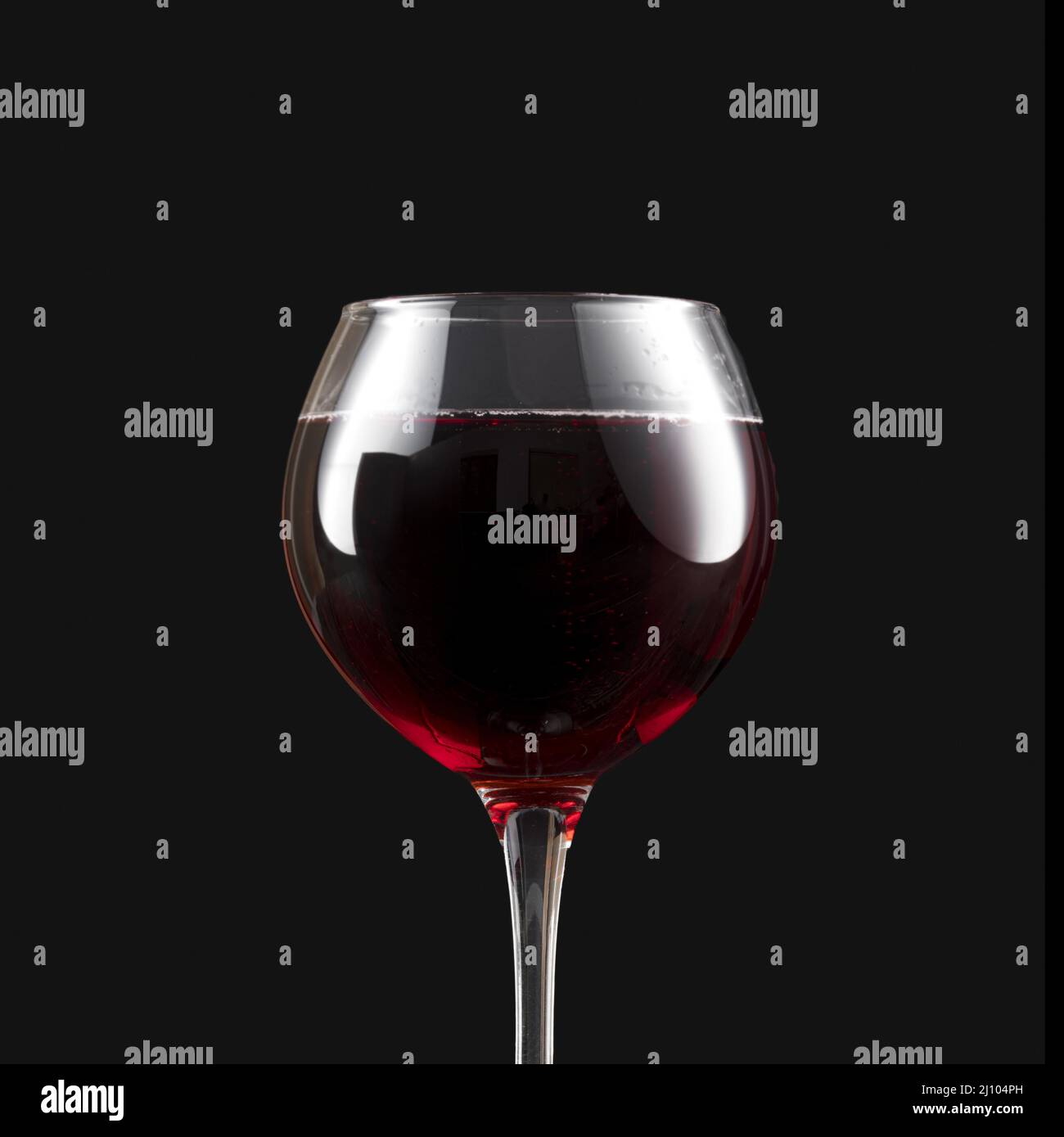Elegant dark red wine glass Stock Photo