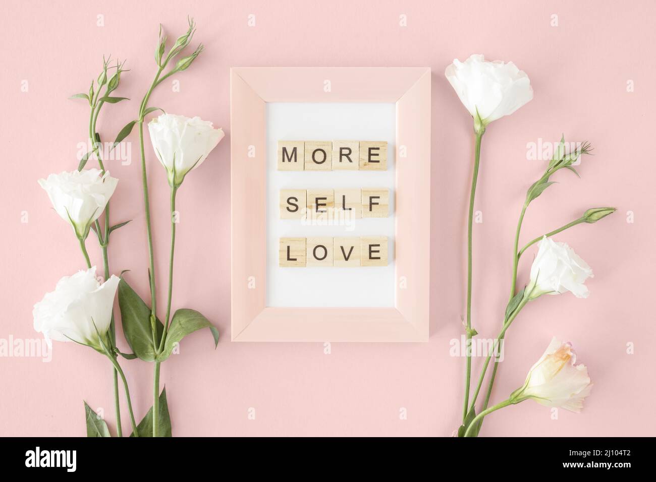Top view pink frame flowers arrangement Stock Photo