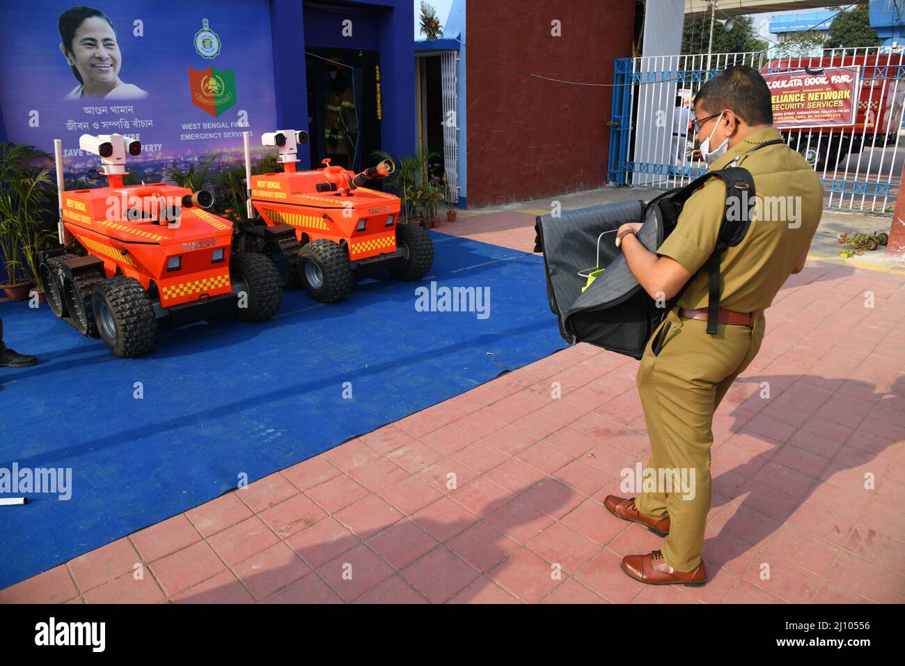 A fire officer operates Swadeshi fire fighting multipurpose robot at