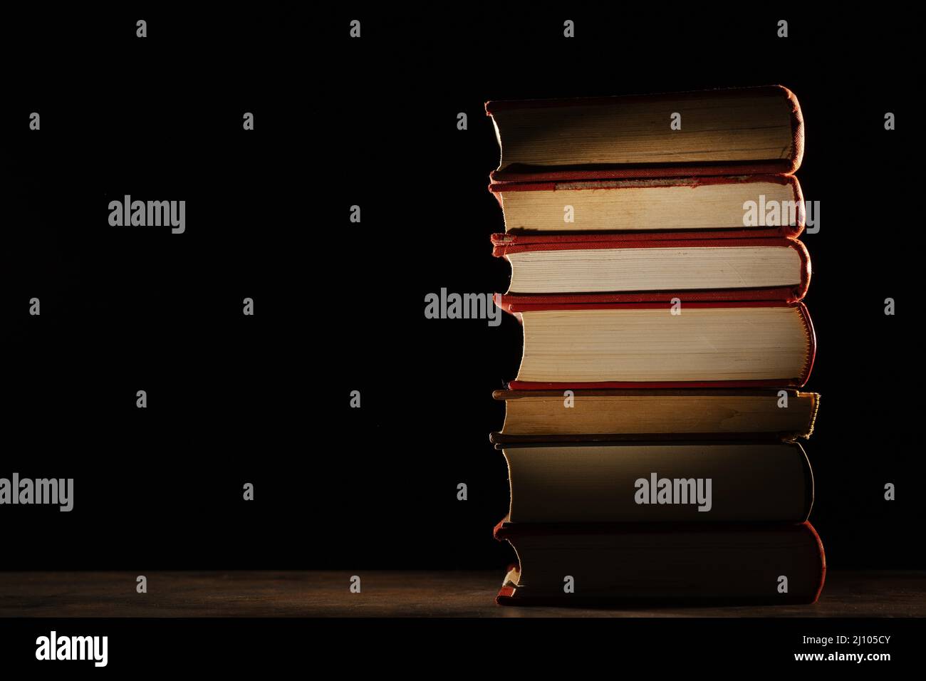 Books stack with copy space Stock Photo - Alamy