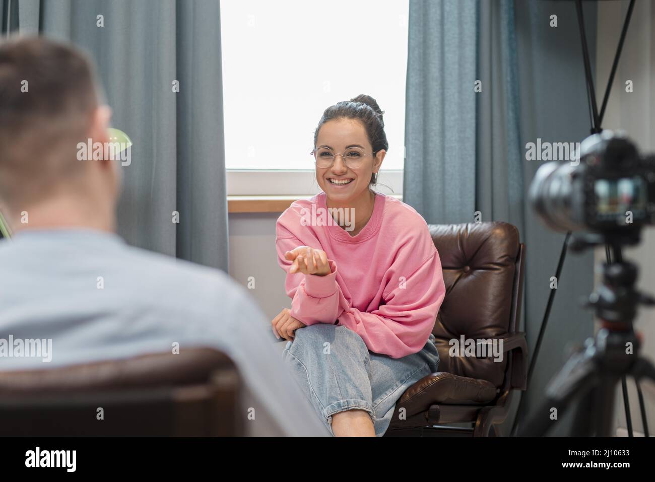 Blogger recording interview home Stock Photo