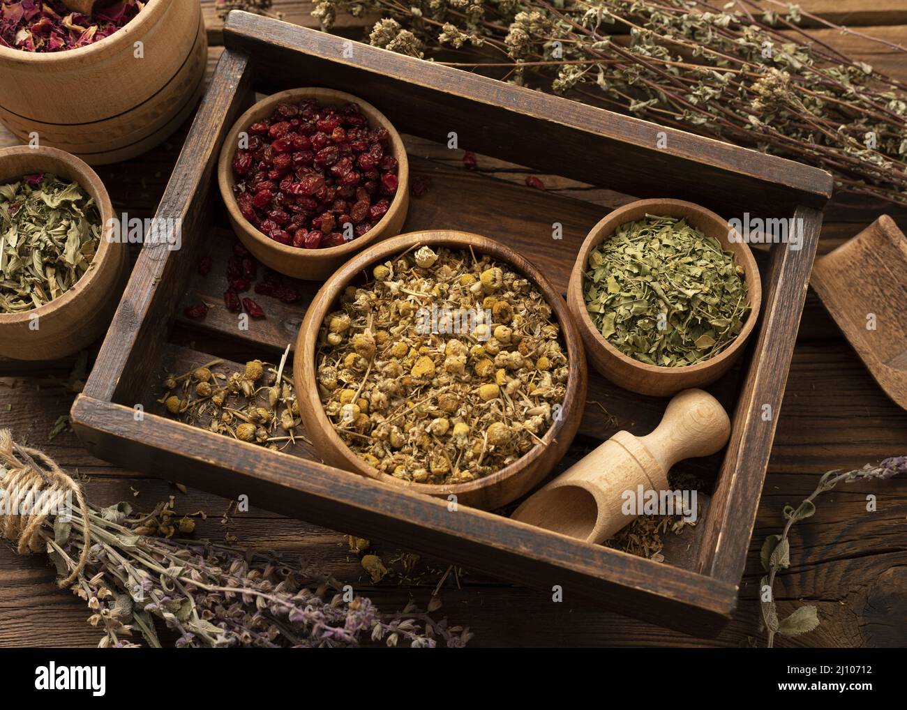 Natural various herbs wooden box high view Stock Photo