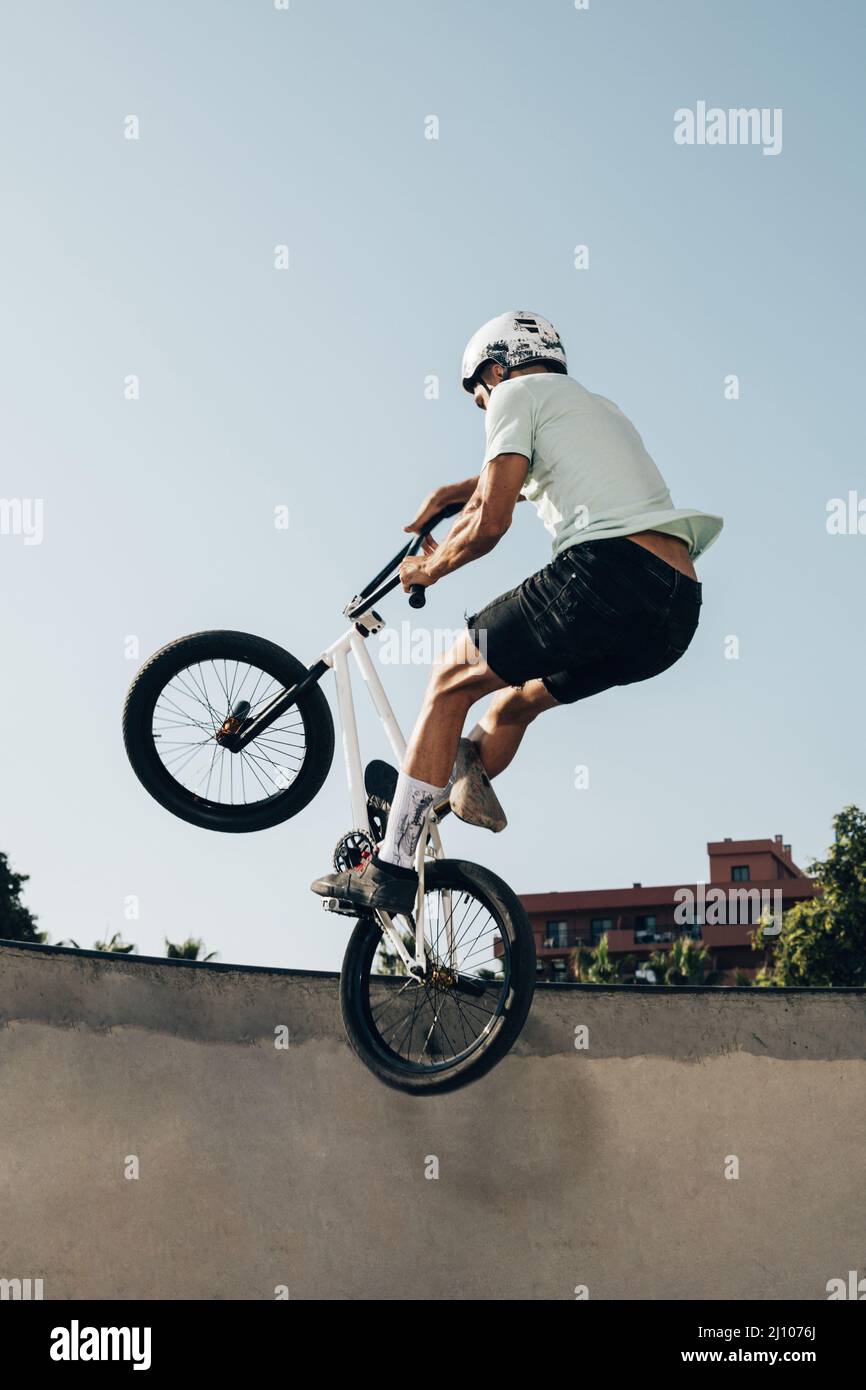 Young man extreme jumping with bicycle Stock Photo