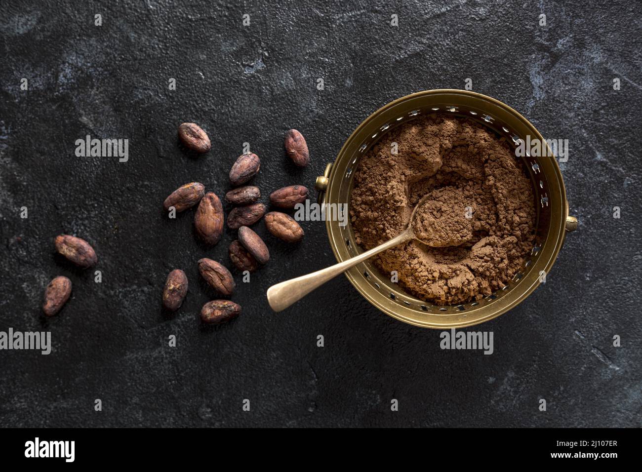 Top view bowl with cocoa powder cocoa beans Stock Photo