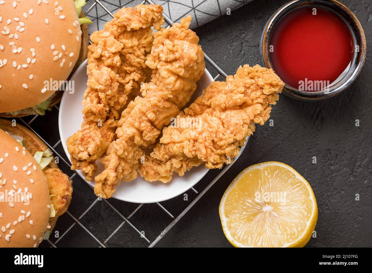 Top view fried chicken burgers tray with sauce lemon Stock Photo