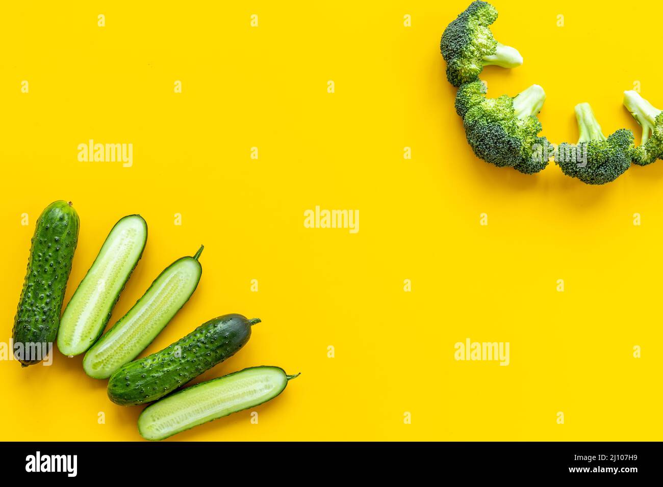 Pattern of green vegetables with broccoli and cucumber. Food background