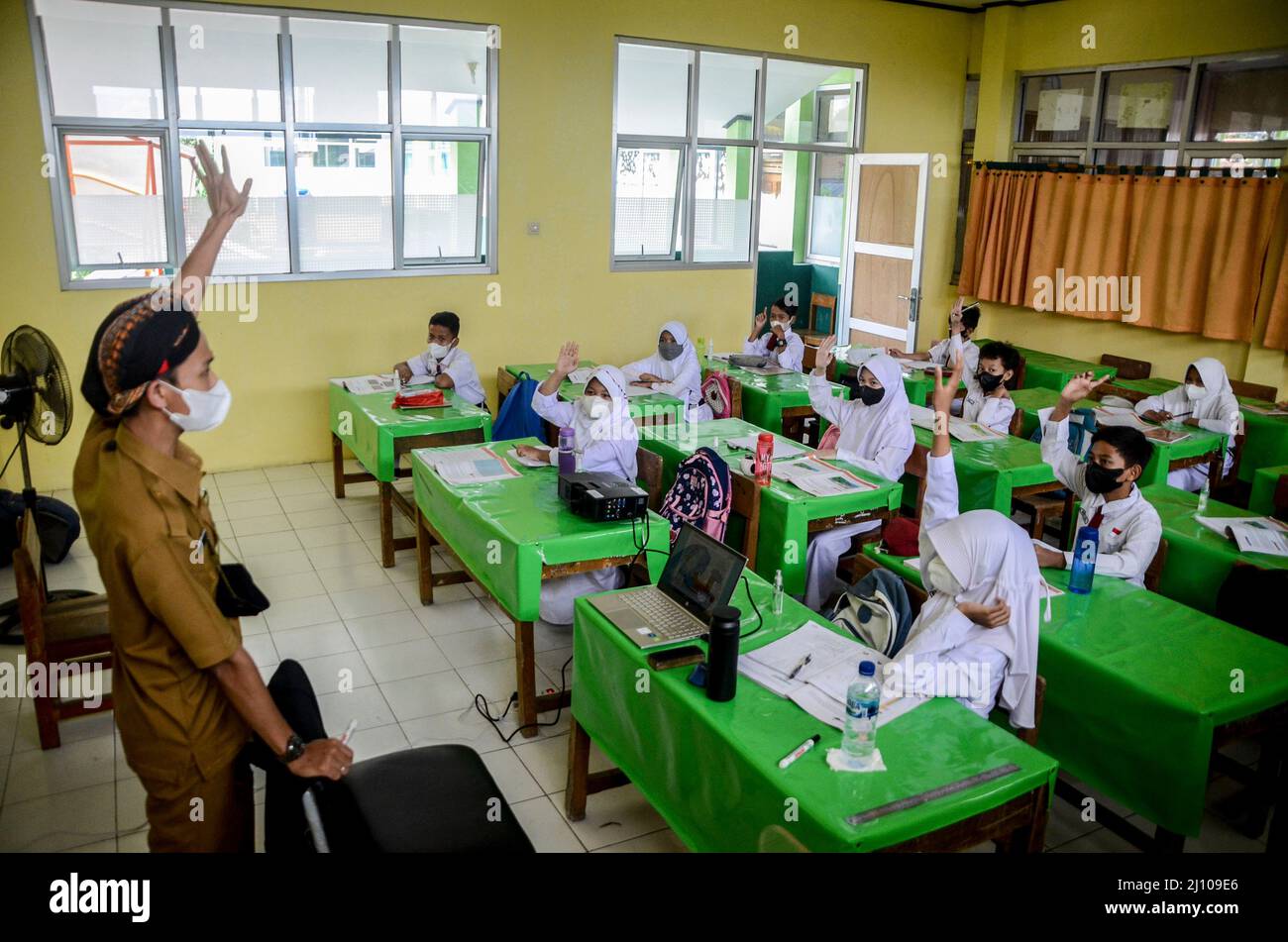 Bogor, Indonesia. 21st Mar, 2022. Students attend a class in Bogor, West Java, Indonesia, March 21, 2022. Credit: Sandika Fadilah/Xinhua/Alamy Live News Stock Photo
