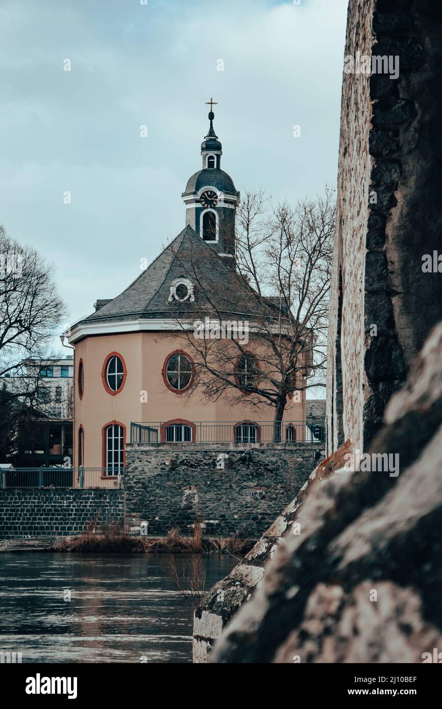 Vertical shot of the exterior design of a small church Stock Photo - Alamy