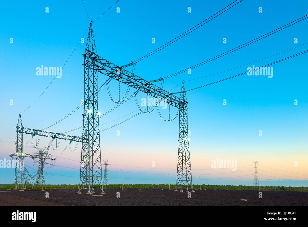 Electric substation and pwer lines in Paraguay at dawn. Stock Photo