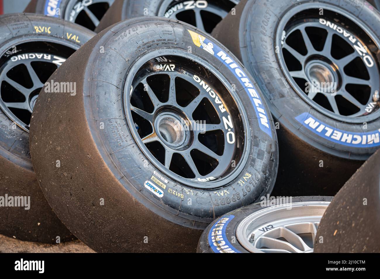 Closeup of the racing wheels on the racing circuit Stock Photo