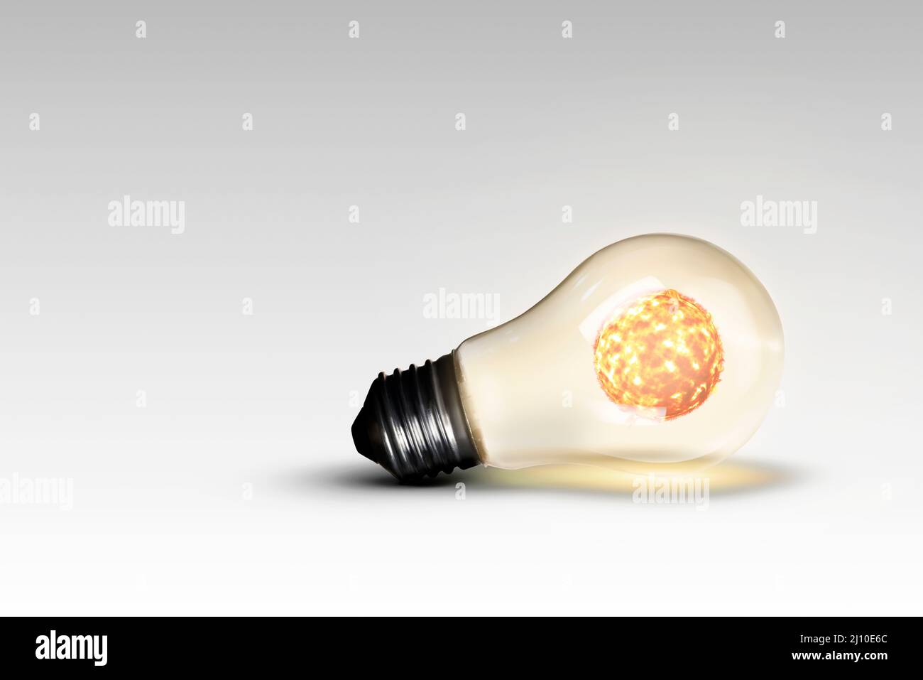Light bulb on a white background with a Sun in it Stock Photo - Alamy