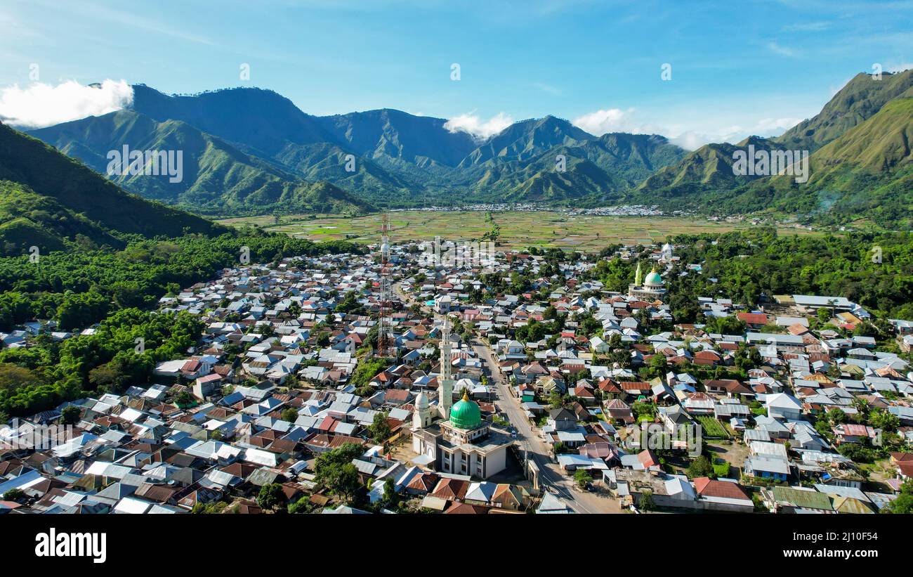Aerial view of some agricultural fields in Sembalun. Sembalun is situated on the slope of mount Rinjani and is surrounded by beautiful green mountains Stock Photo
