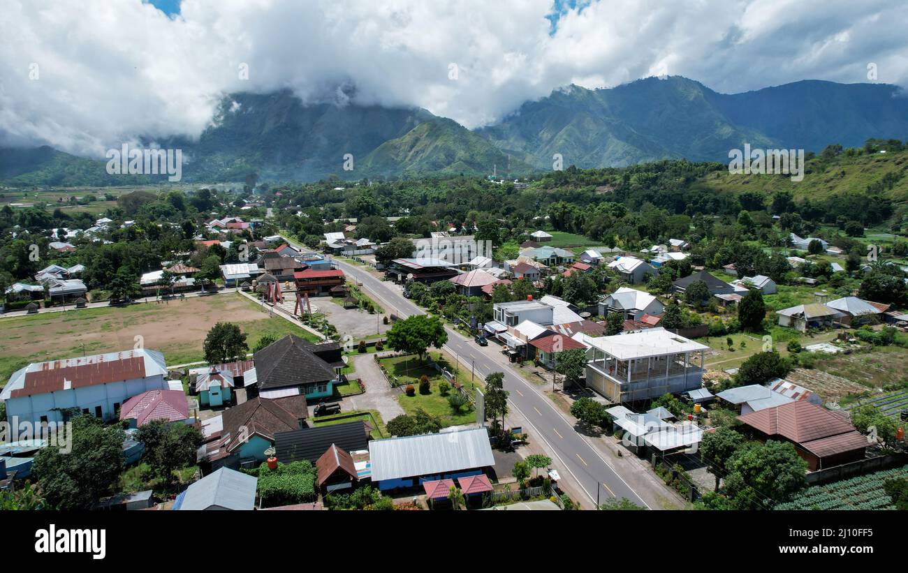 Aerial view of some agricultural fields in Sembalun. Sembalun is situated on the slope of mount Rinjani and is surrounded by beautiful green mountains Stock Photo