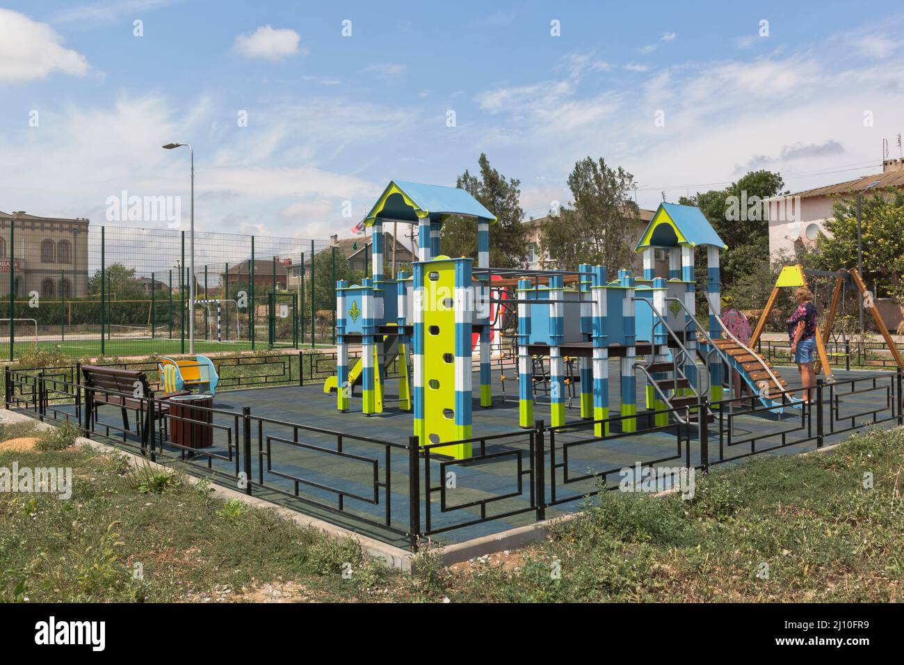 Playground on Kirov street in the village of Uyutnoye, Saki district, Evpatoria, Crimea, Russia Stock Photo