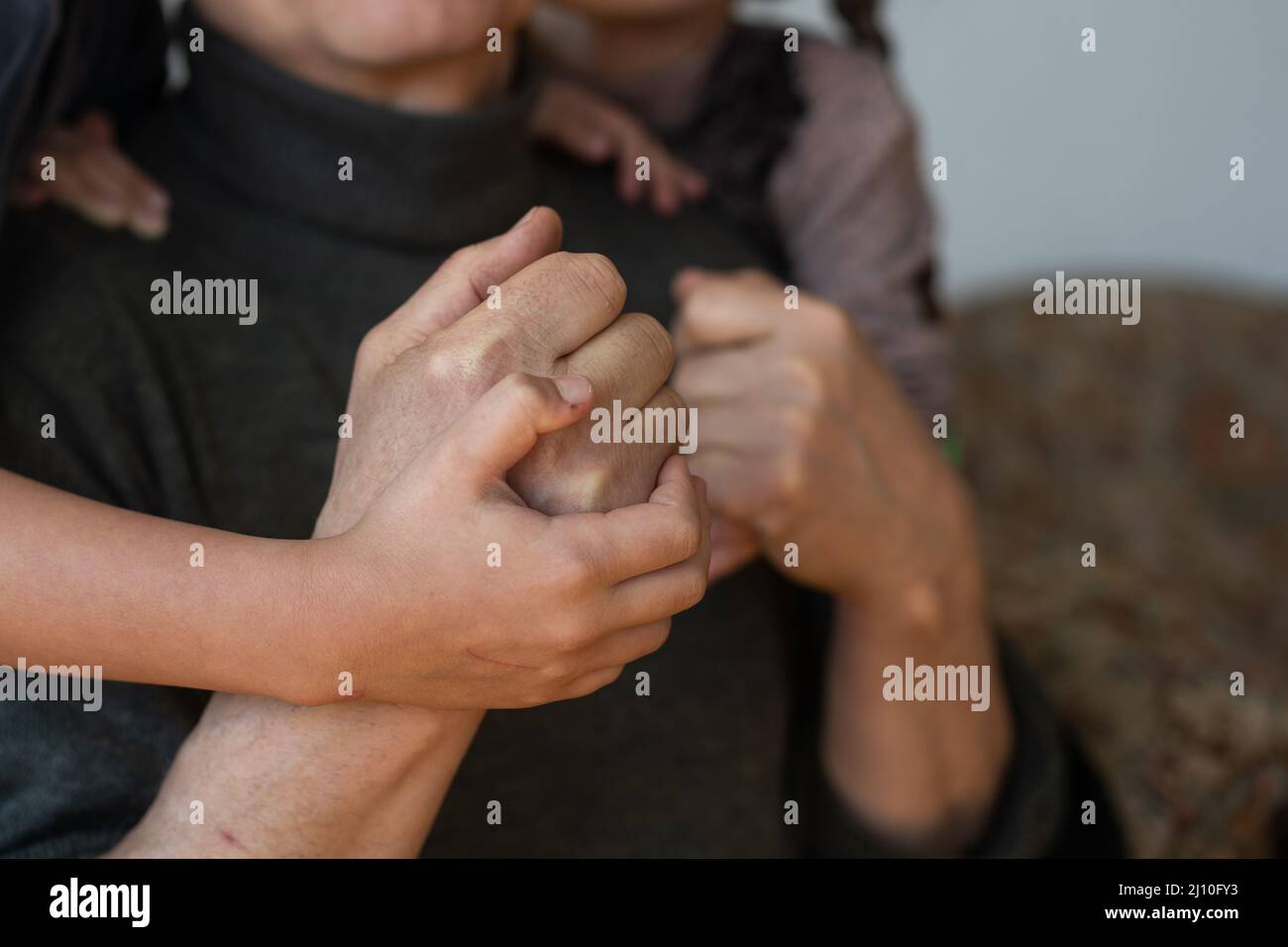 Hands of the old man and a child's hand Stock Photo - Alamy