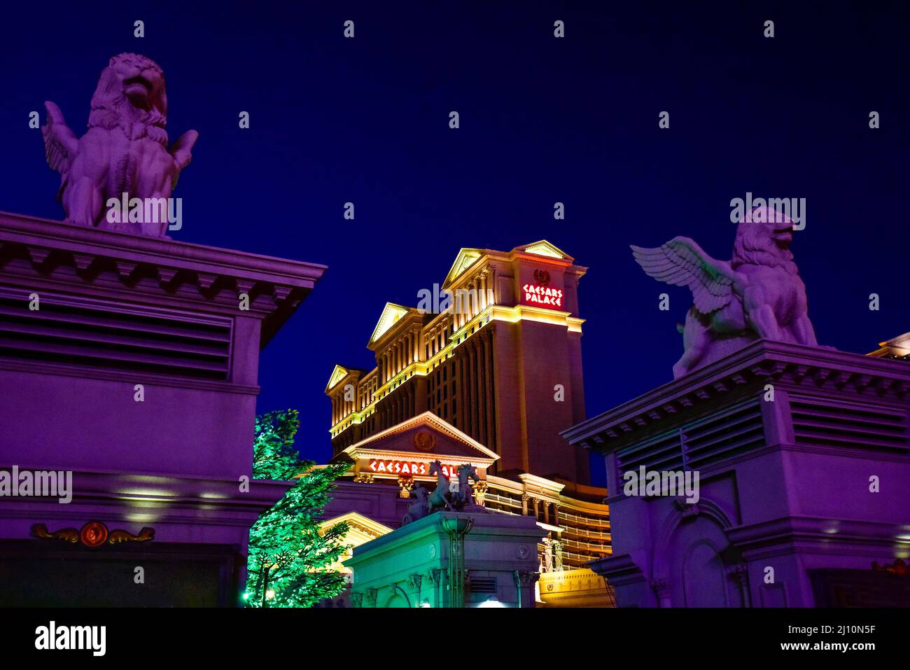 Caesars Palace lit up at night on the Las Vegas Strip Stock Photo