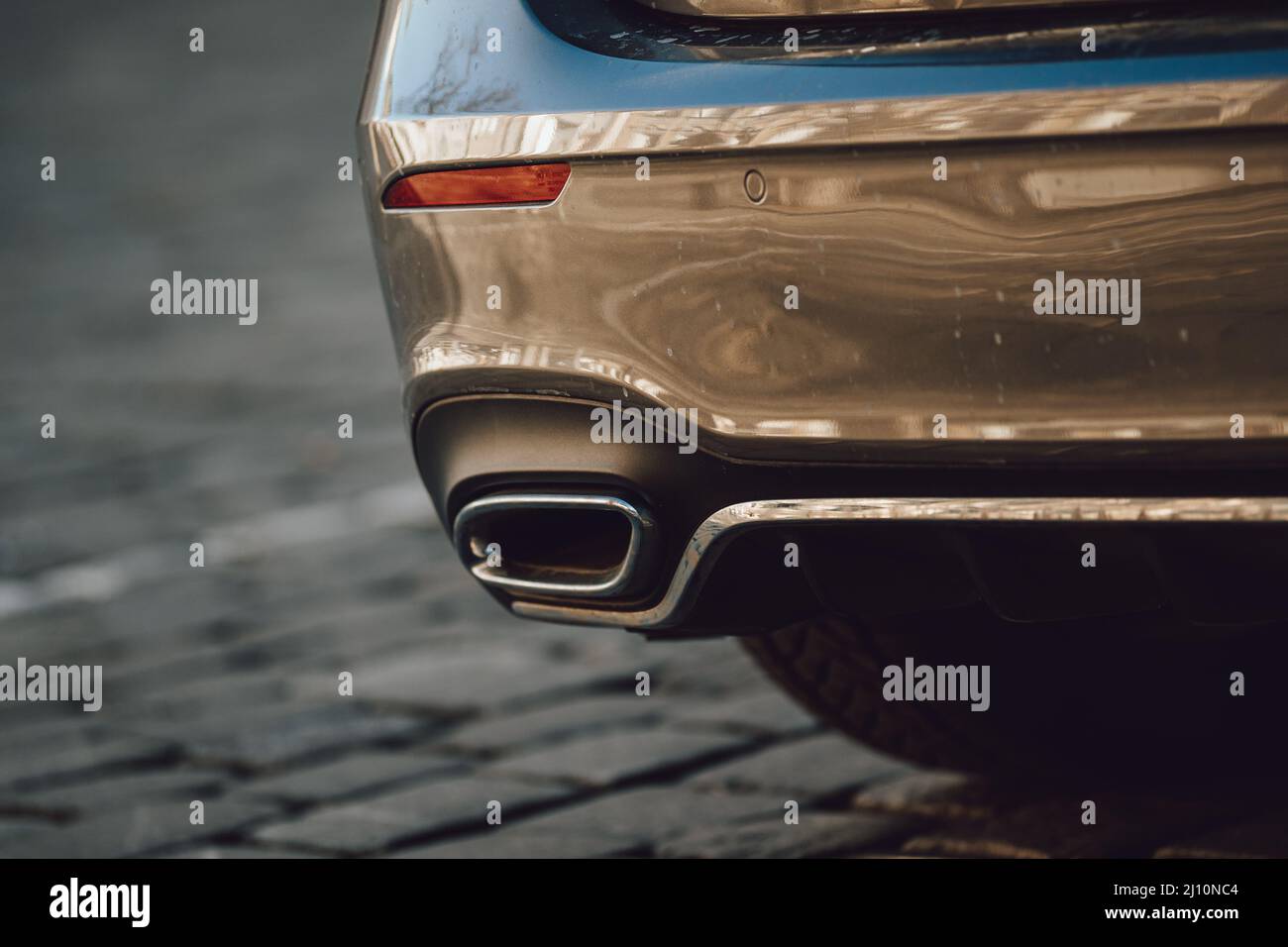 Closeup of a luxury car exhaust in Straubing Stock Photo Alamy