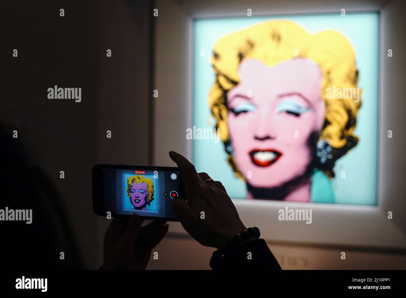 Andy Warhol's 'Shot Sage Blue Marilyn', a painting of Marilyn Monroe, is pictured on display at Christie's Auction House in advance of the piece going up for auction in the Manhattan borough of New York City, New York, U.S., March 21, 2022. REUTERS/Carlo Allegri Stock Photo