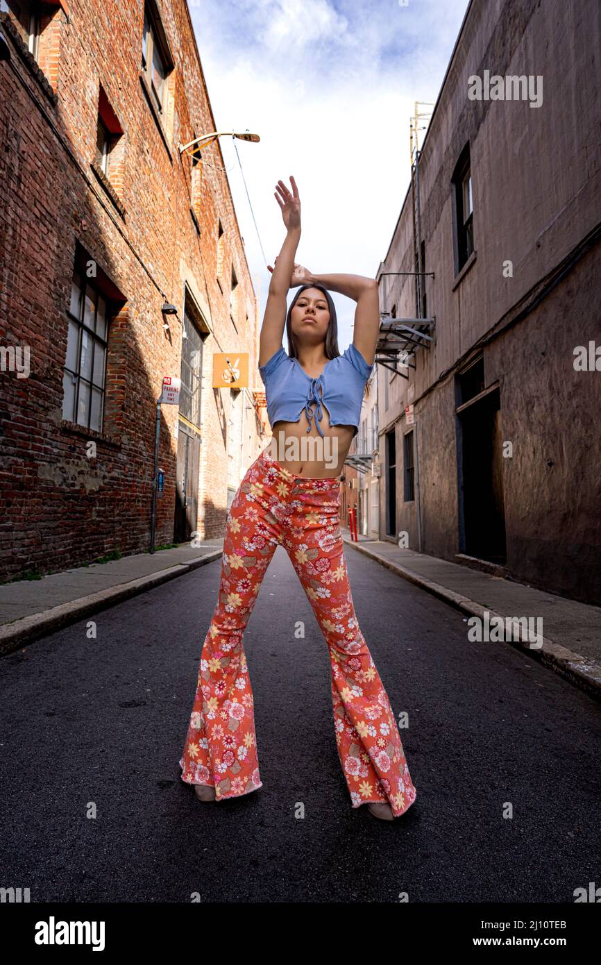 Teenage Female Dressed in 60s Fashion Clothes in San Francisco Downtown  Alleyway Stock Photo - Alamy