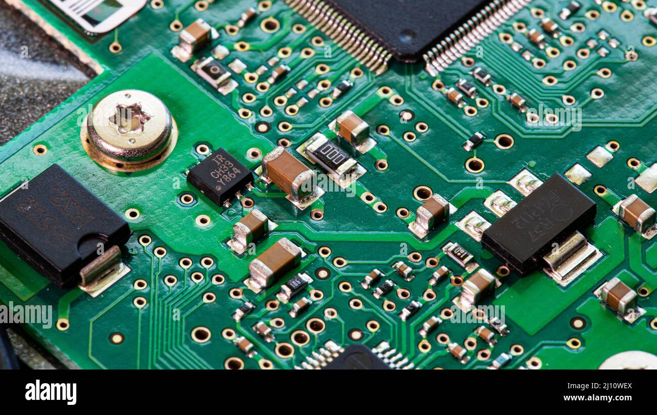 Macro Close up of components and microchips on PC circuit board of Hard