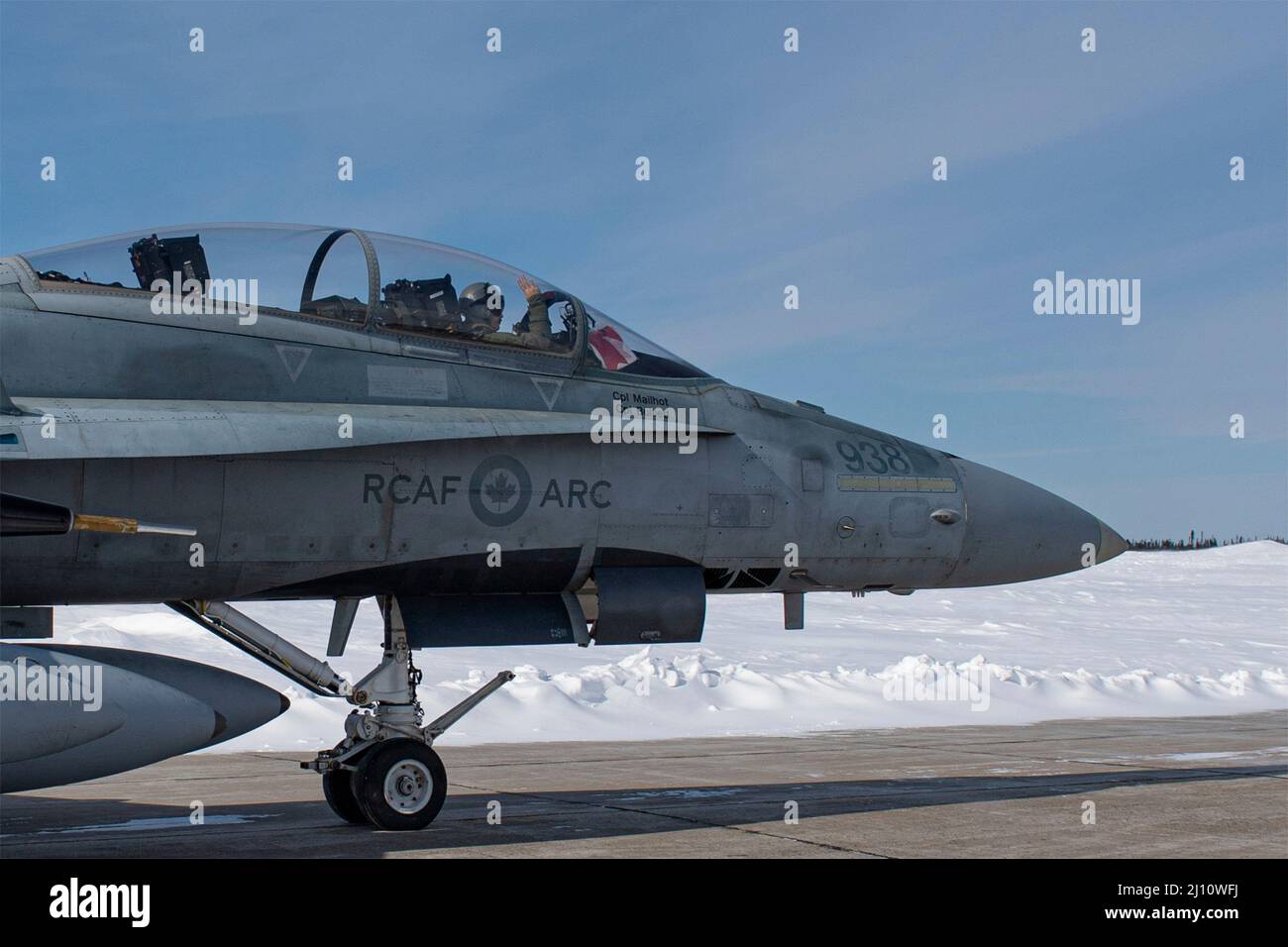 Goose Bay, Canada. 16 March, 2022. A Royal Canadian Air Force CF-18 fighter jet from 433 Tactical Fighter Squadron, taxis to depart during Operation Noble Defender March 16, 2022 in Goose Bay, Newfoundland, Canada. The NORAD exercise is part of recent military moves to deter Russian involvement in Ukraine.  Credit: CANR NORAD/U.S. Air Force/Alamy Live News Stock Photo