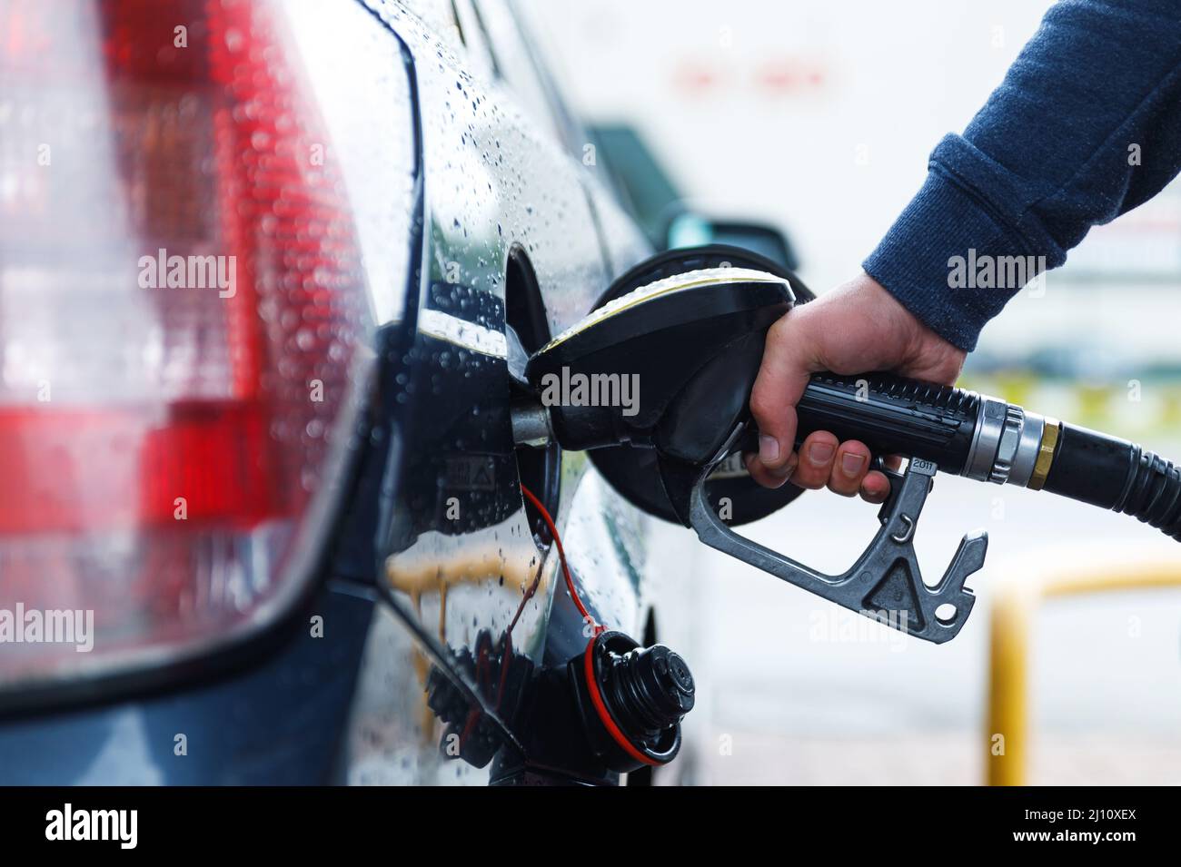 Man is filling tank of his car on the gas station Stock Photo - Alamy