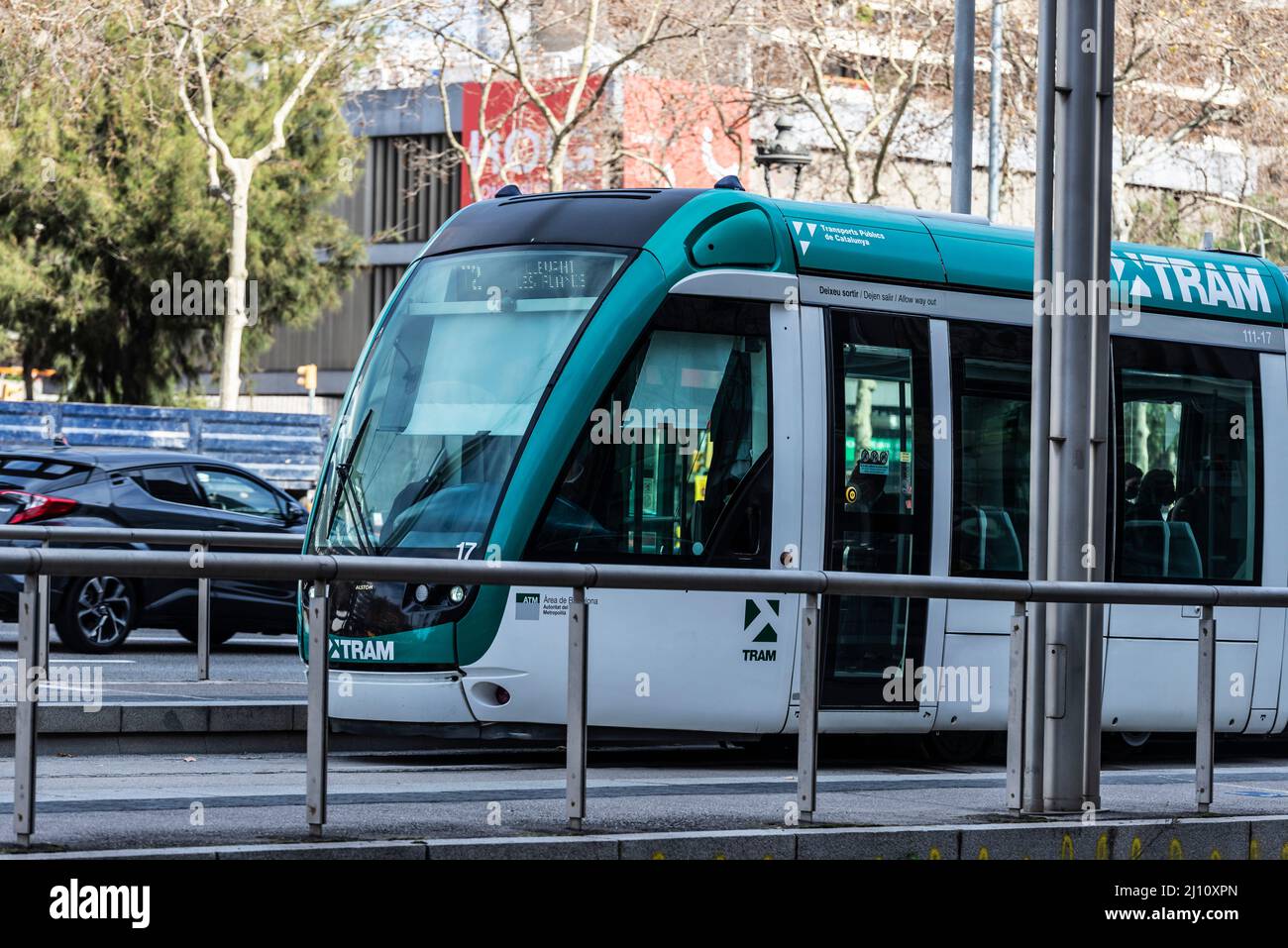 Barcelona, Spain - February 24, 2022: Barcelona tram known as Trambaix. In the picture the tram is going through the Diagonal avenue in Barcelona, Cat Stock Photo