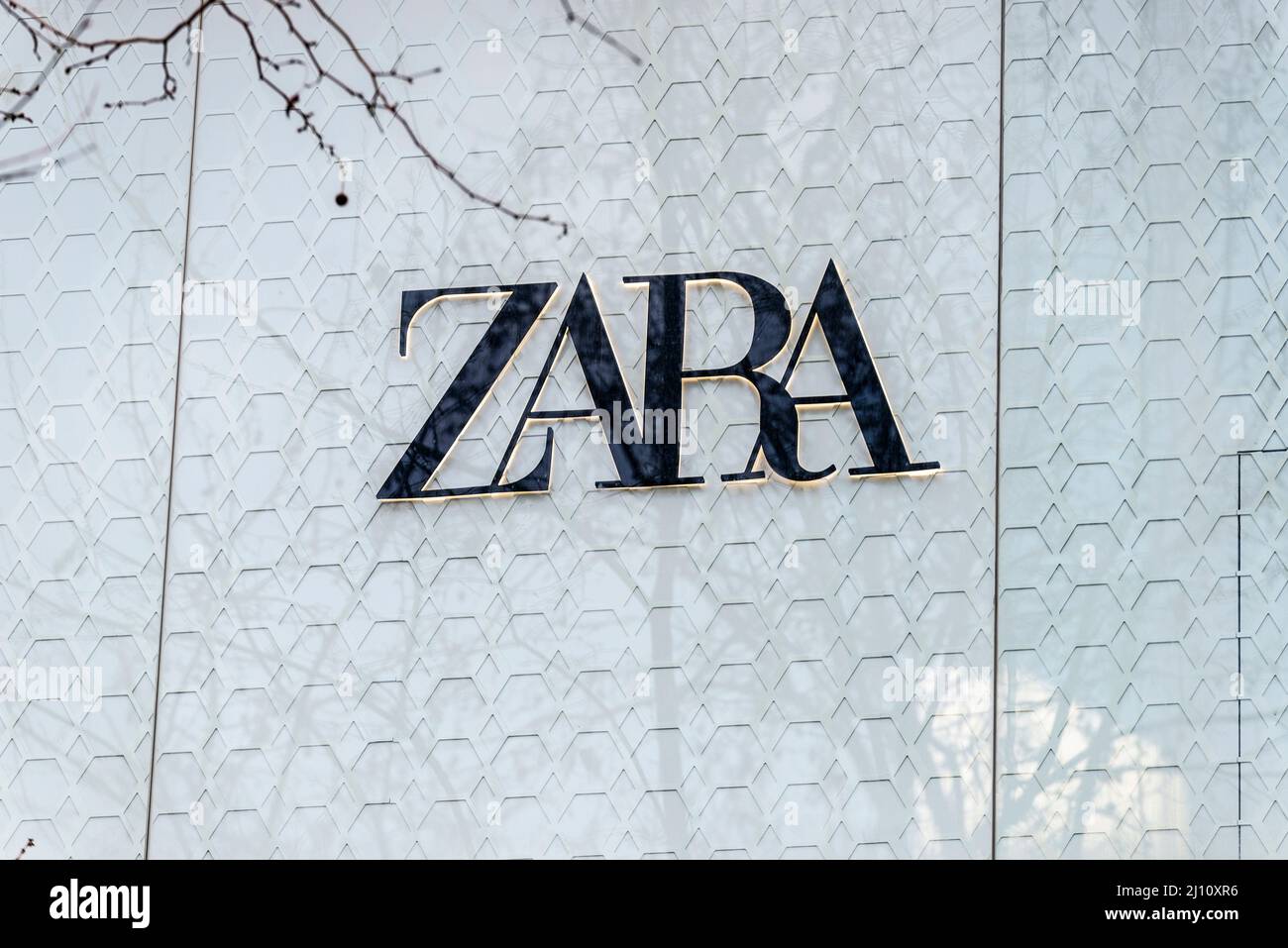 Barcelona, Spain - February 24, 2022: Sign of a Zara clothing store in Diagonal avenue, shopping street of Barcelona, Catalonia, Spain Stock Photo