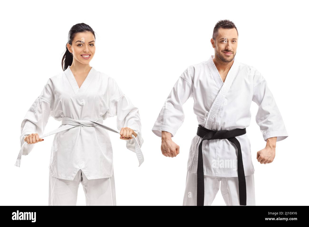 Woman with white karate belt and man with karate black belt isolated on white background Stock Photo