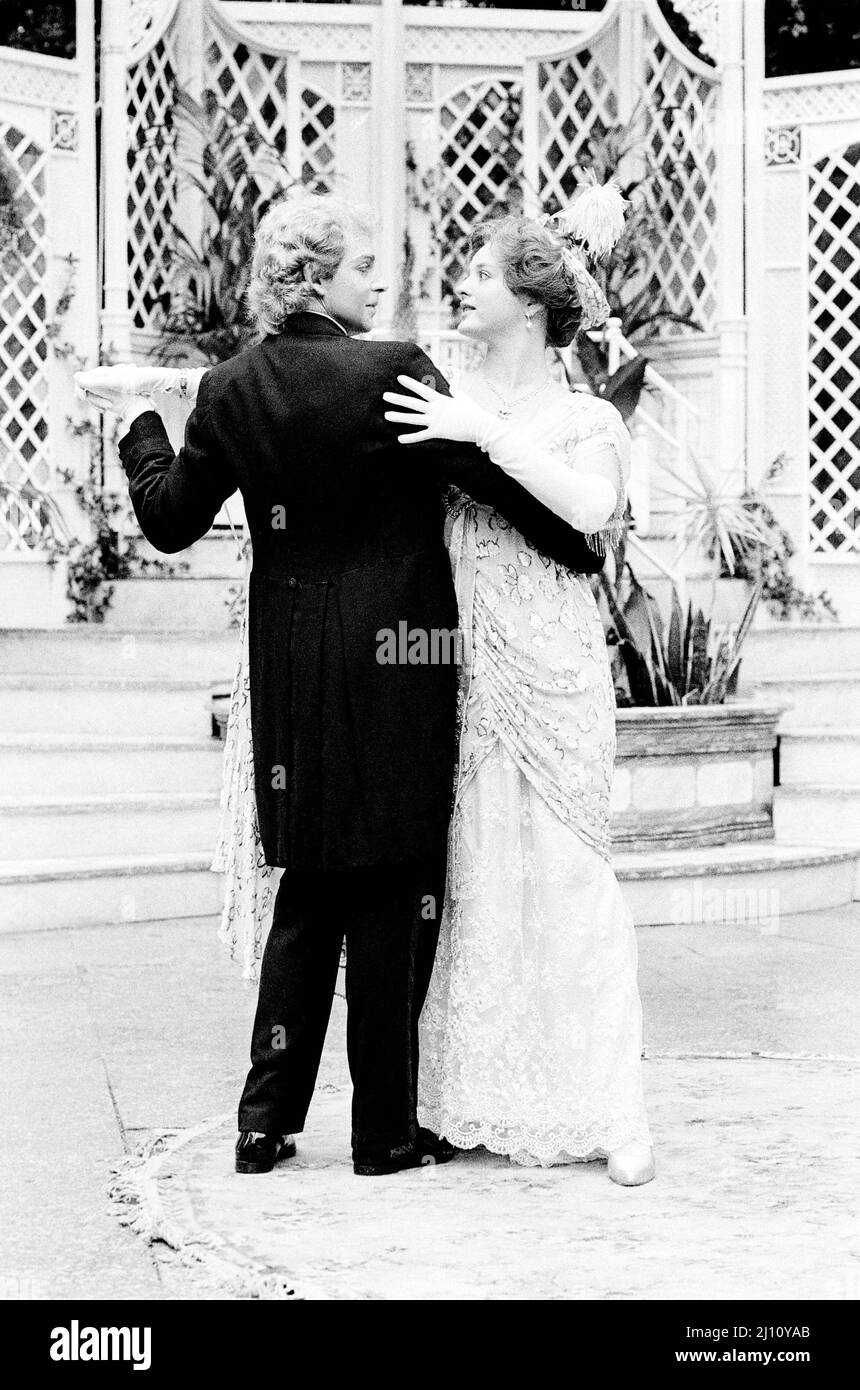 Patrick Ryecart (Hugo / Frederic), Serena Gordon (Diana Messerschmann) in RING ROUND THE MOON by Christopher Fry adapted from ‘Invitation to the Castle’ by Jean Anouilh at the Open Air Theatre, Regent’s Park, London NW1  30/07/1985  set design: Simon Higlett  costumes: Tim Goodchild  lighting: Ian Callander  choreographer: Terry John Bates  director: David Conville Stock Photo