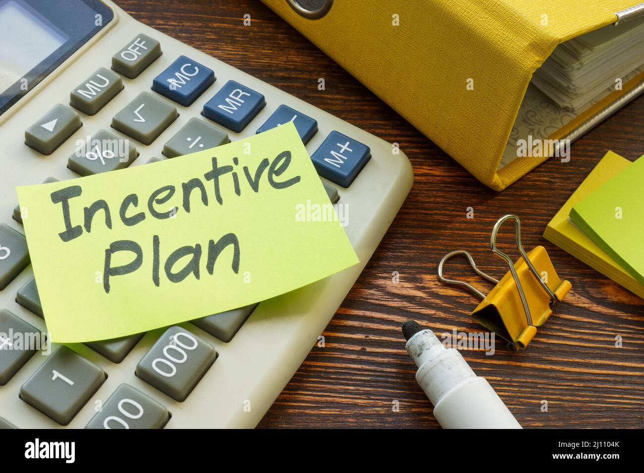 Sticker with words Incentive plan on the calculator. Stock Photo