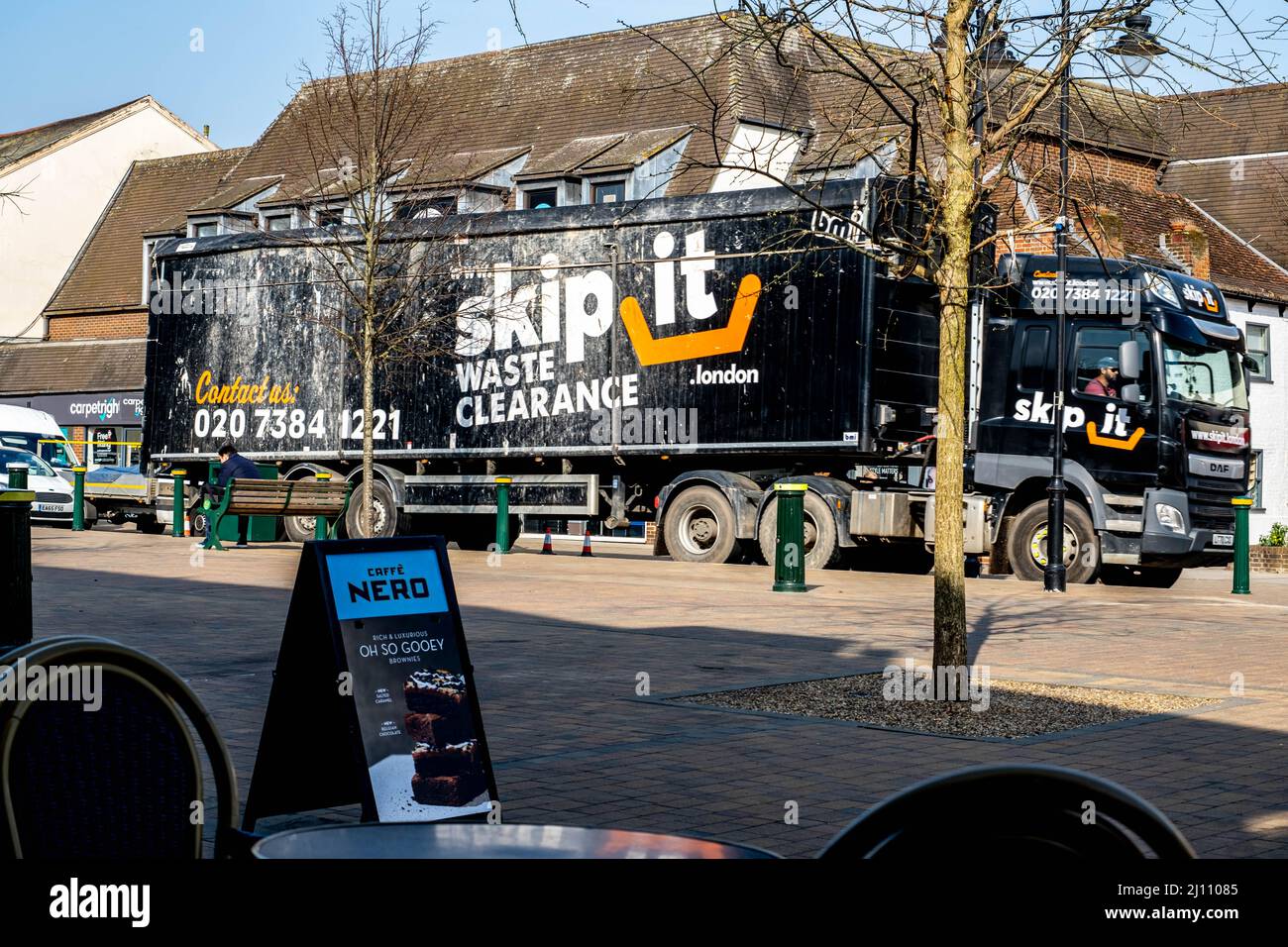 Epsom Surrey London UK, March 21 2022, Articulated Lorry Carrying Waste Outside Cafe Nero With No People Stock Photo