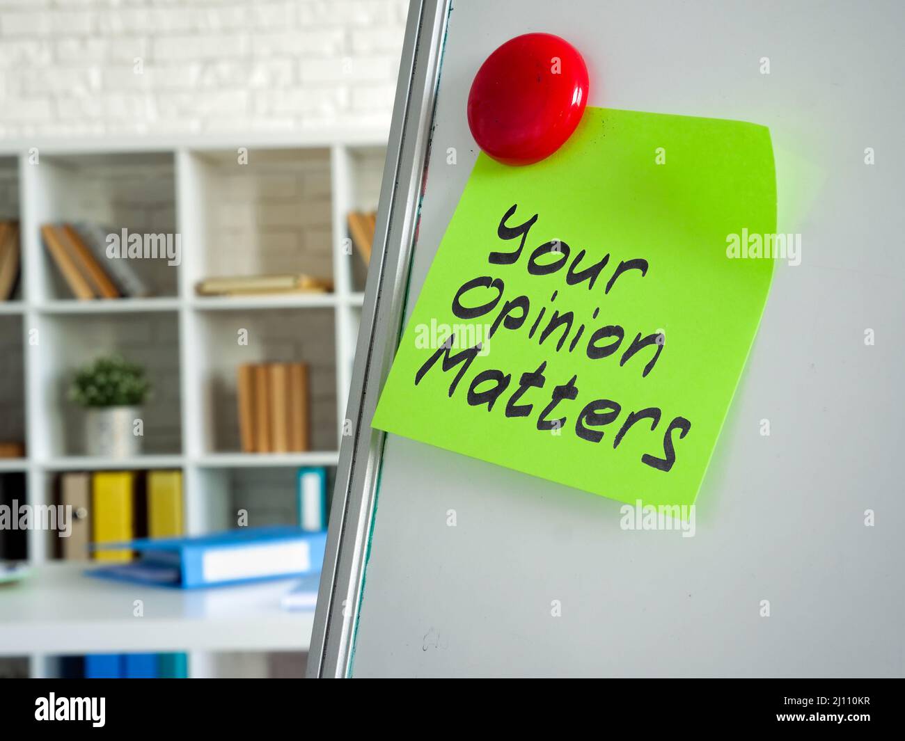 Your opinion matters sign on the whiteboard in the office. Stock Photo