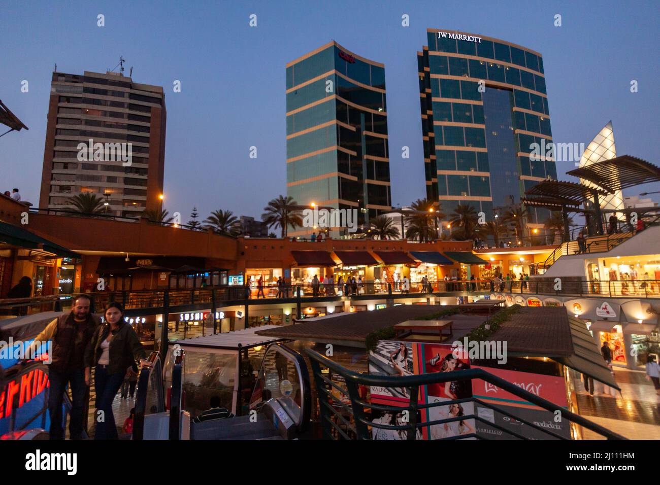 Evening view of an open air shopping mall in Miraflores, Lima, Peru