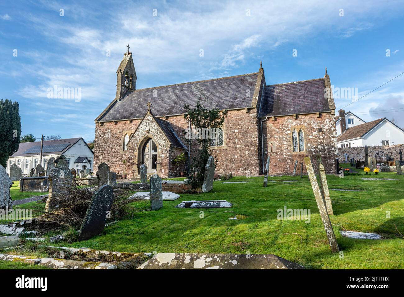 St George's Church is the Anglican Church in the centre of the village of Reynoldston on Gower Peninsula, Wales Stock Photo