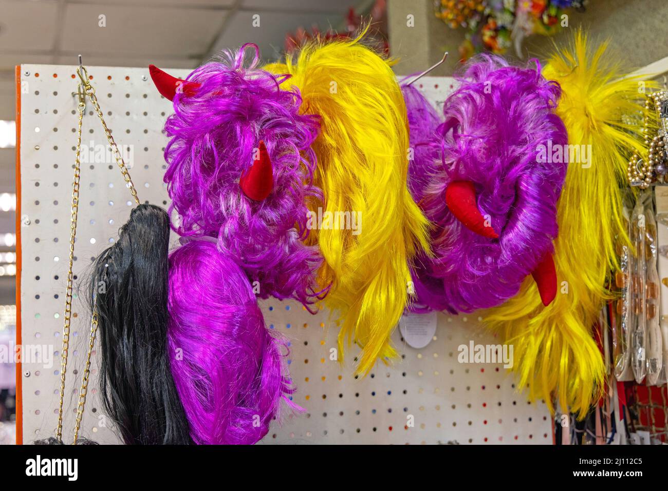 Colourful Hair Wigs With Devil Horns Party Costume Stock Photo Alamy