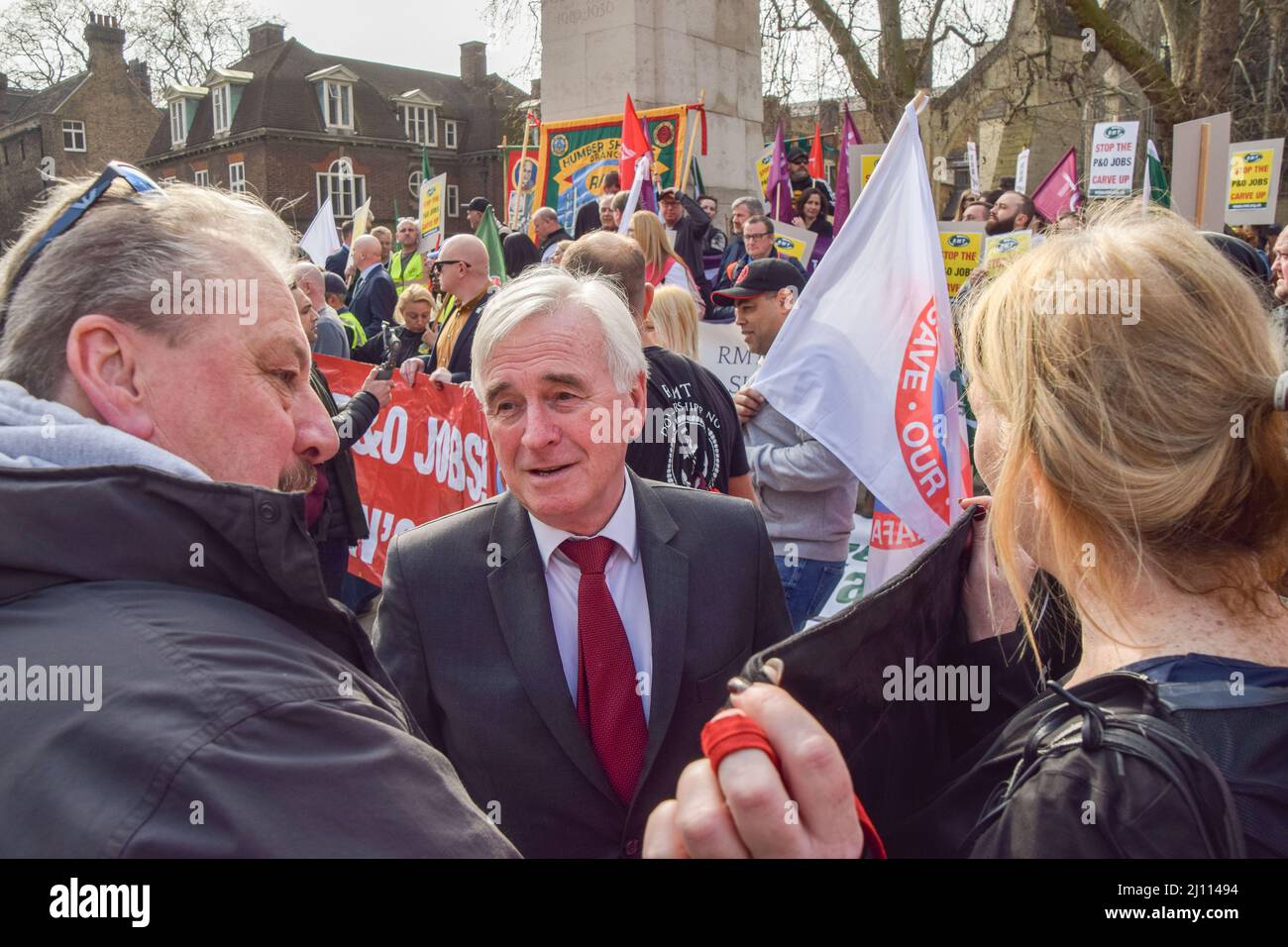 London, UK. 21st March 2022. Labour MP John McDonnell speaks to protesters outside Parliament. P&O Ferries staff and RMT Union members marched from the headquarters of DP World, the company which owns P&O, to Parliament, after 800 UK staff were fired and replaced by agency workers. Credit: Vuk Valcic/Alamy Live Newsspeaking Stock Photo