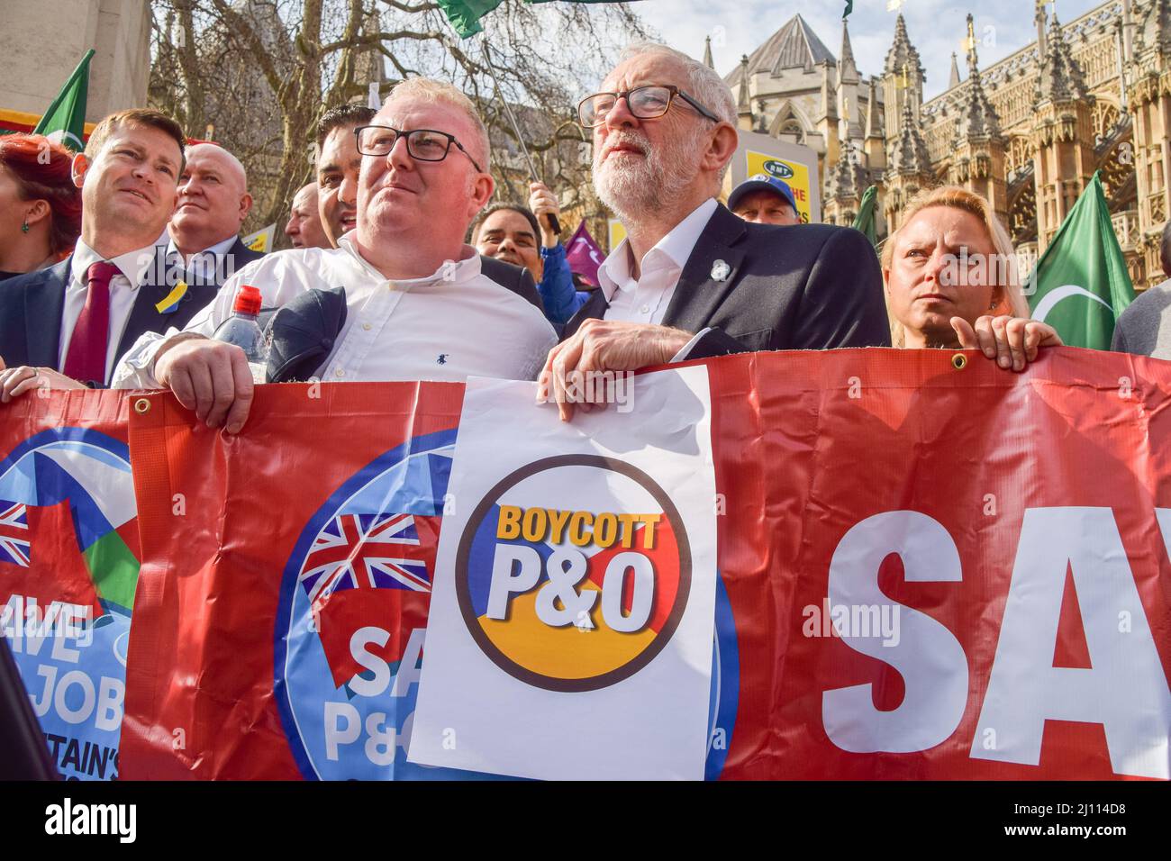 London, UK. 21st March 2022. Labour MP Jeremy Corbyn joins the protesters outside Parliament. P&O Ferries staff and RMT Union members marched from the headquarters of DP World, the company which owns P&O, to Parliament, after 800 UK staff were fired and replaced by agency workers. Credit: Vuk Valcic/Alamy Live News Stock Photo