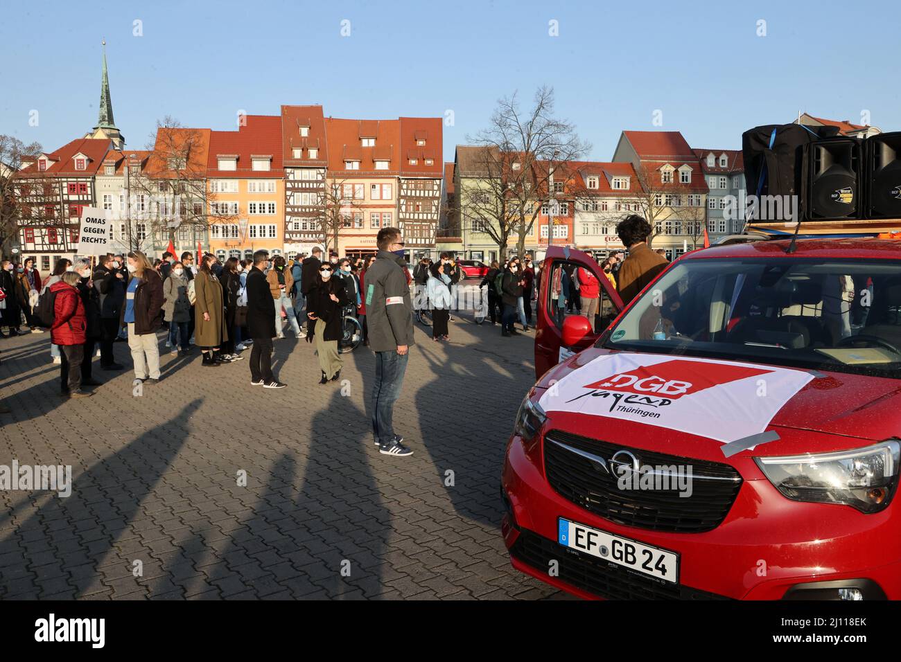 Erfurt, Germany. 21st Mar, 2022. Participants of a rally against racism stand on the Domplatz. March 21, 2022 is the International Day against Racism and has the motto 'Racism is everyday life - racism is also your problem!' Credit: Bodo Schackow/dpa-Zentralbild/dpa/Alamy Live News Stock Photo