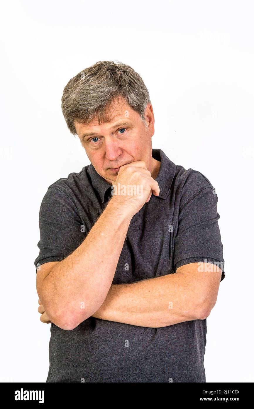 portrait of mature man looking in deep sorrow Stock Photo