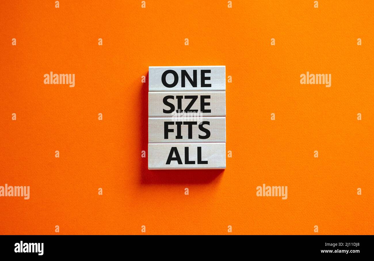 One size fits all symbol. Concept words One size fits all on wooden