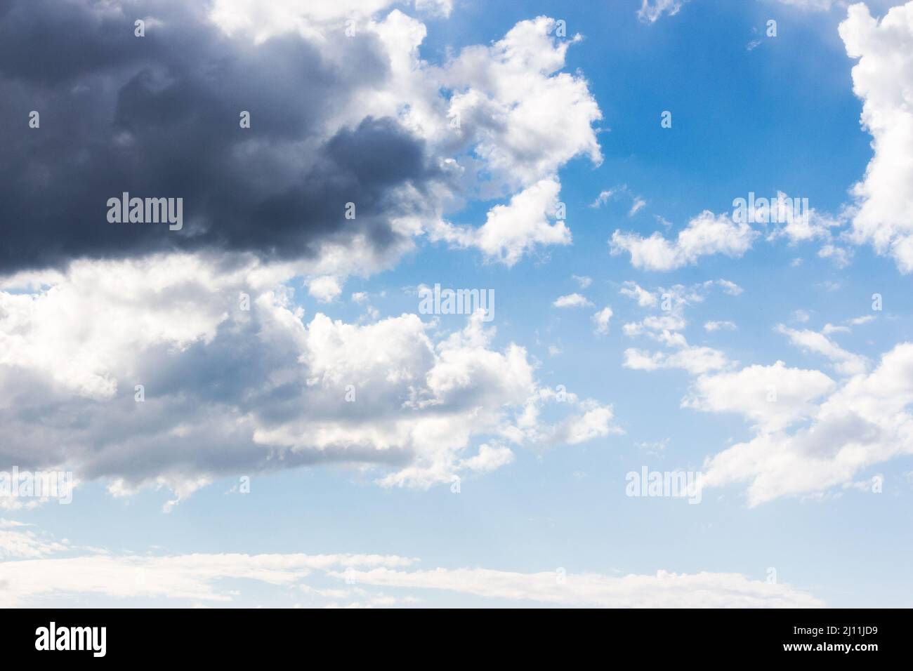 blue sky and white clouds on a sunny weather. world environment day concept. nature series in summer. creative gradient background for installation an Stock Photo