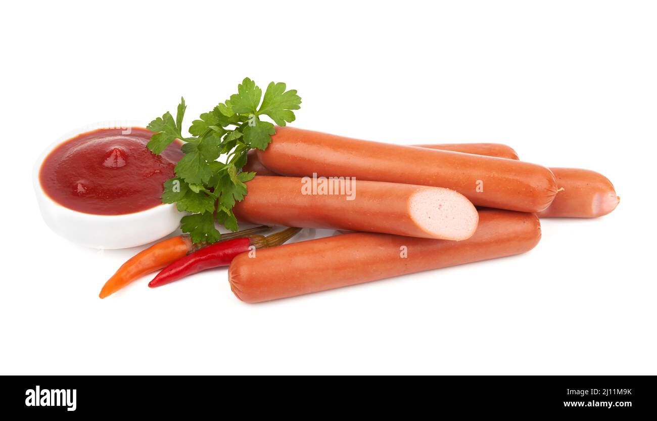 Fresh sausages with parsley leaves isolated on white background Stock Photo