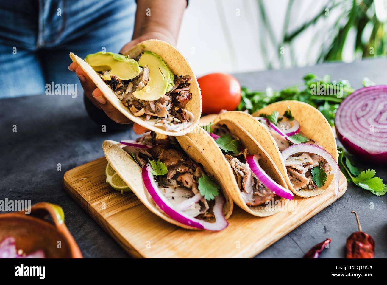 mexican street tacos with lemon, sauce, onion and cilantro Traditional