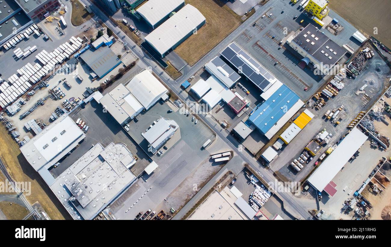 Aerial view of industrial complex with companies and logistic halls in Lannach, Austria Stock Photo