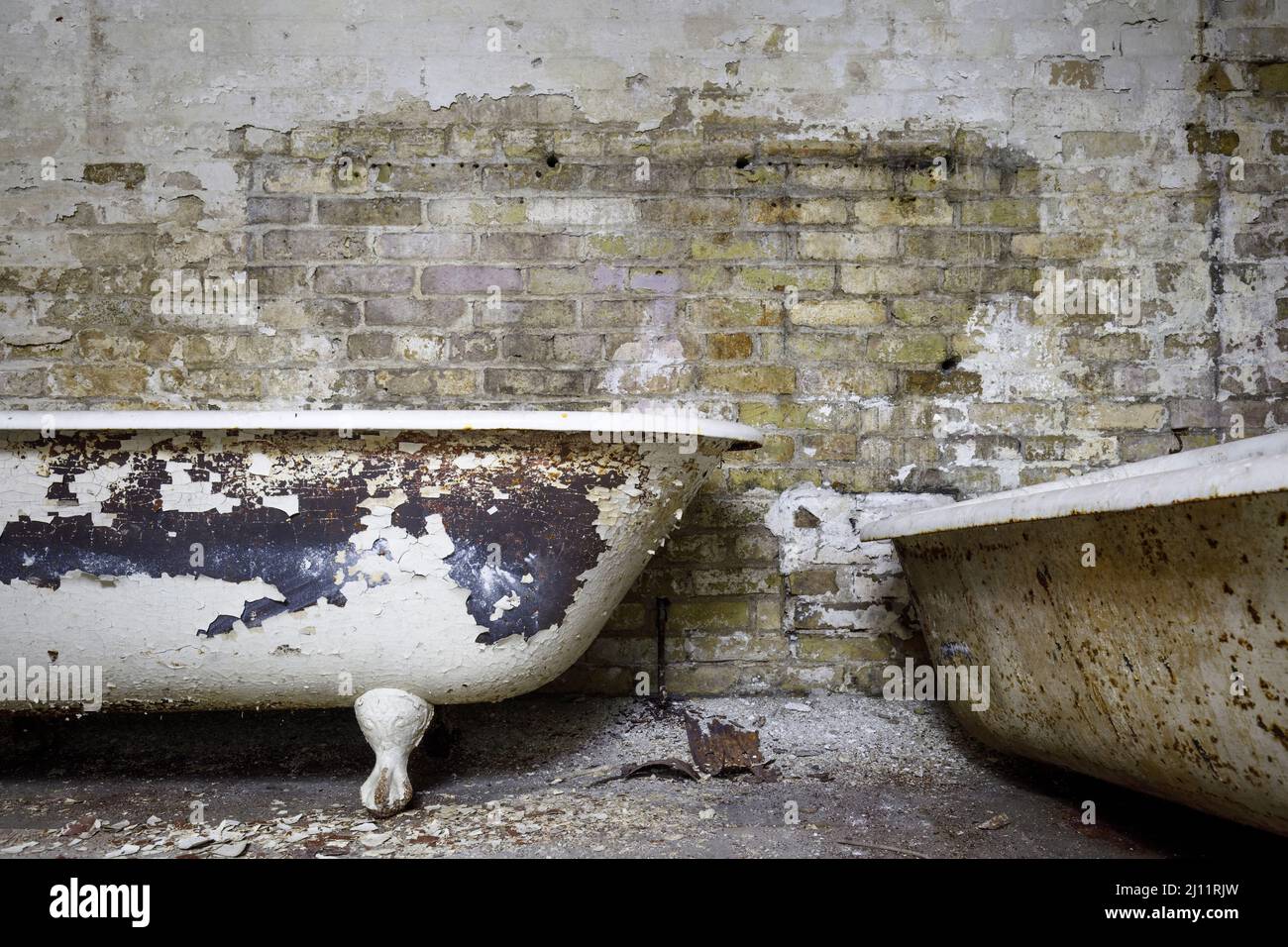 Rusty clawfoot bathtubs. Stock Photo
