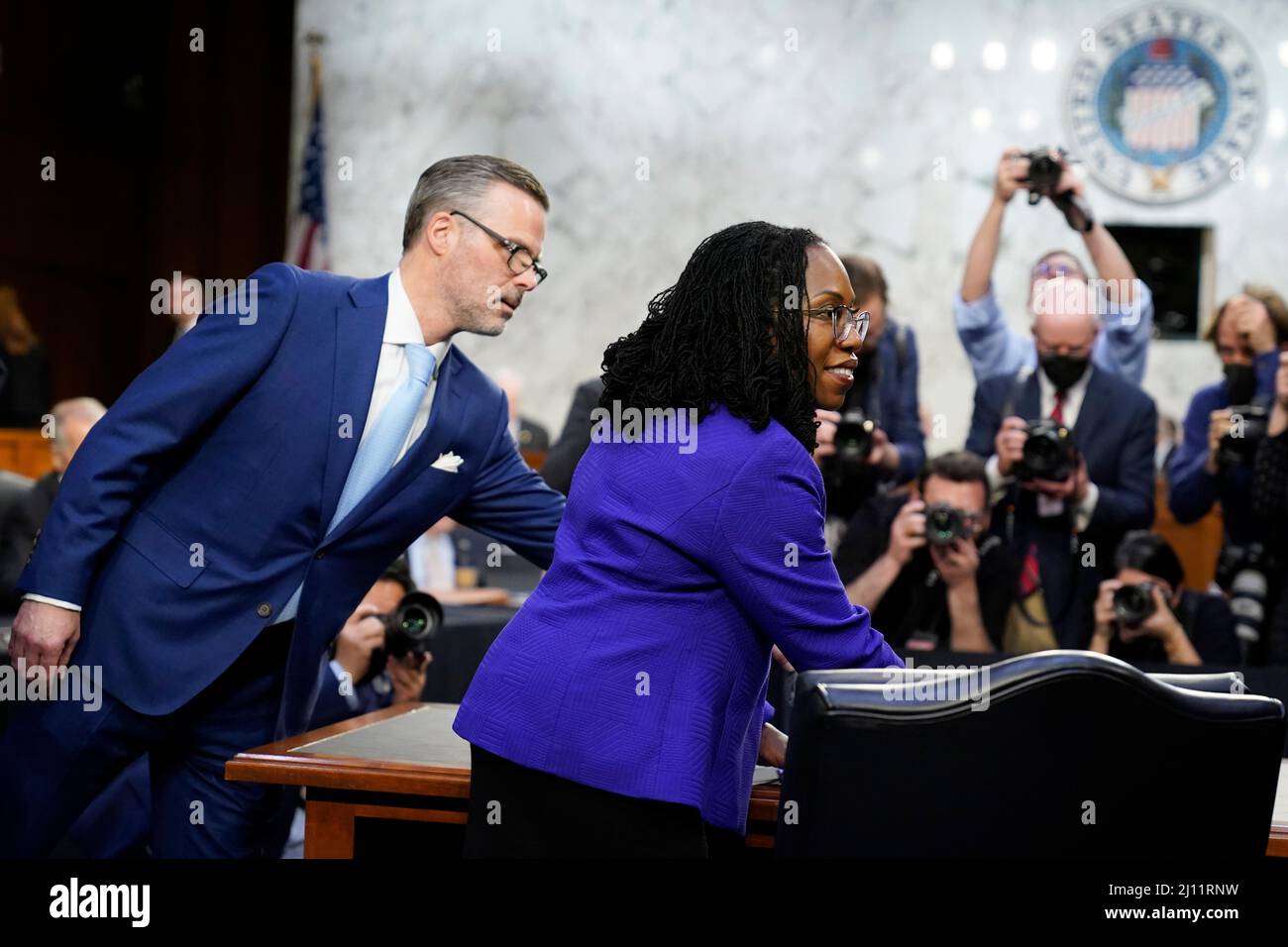 Supreme Court nominee Ketanji Brown Jackson and her husband Dr. Patrick Jackson return from a break in her Senate Judiciary Committee confirmation hearing on Capitol Hill in Washington, Monday, March 21, 2022.Credit: J. Scott Applewhite/Pool via CNP /MediaPunch Stock Photo