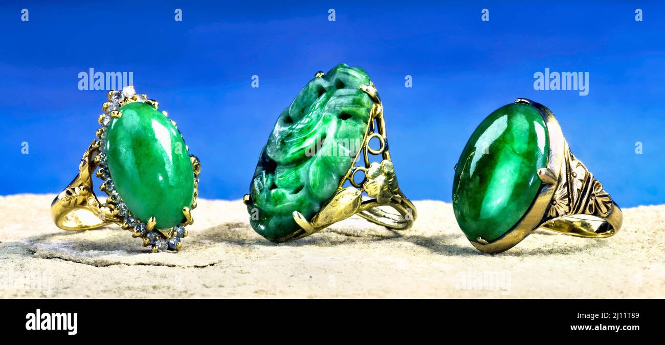 Burmese imperal green jadeite gold rings. Stock Photo