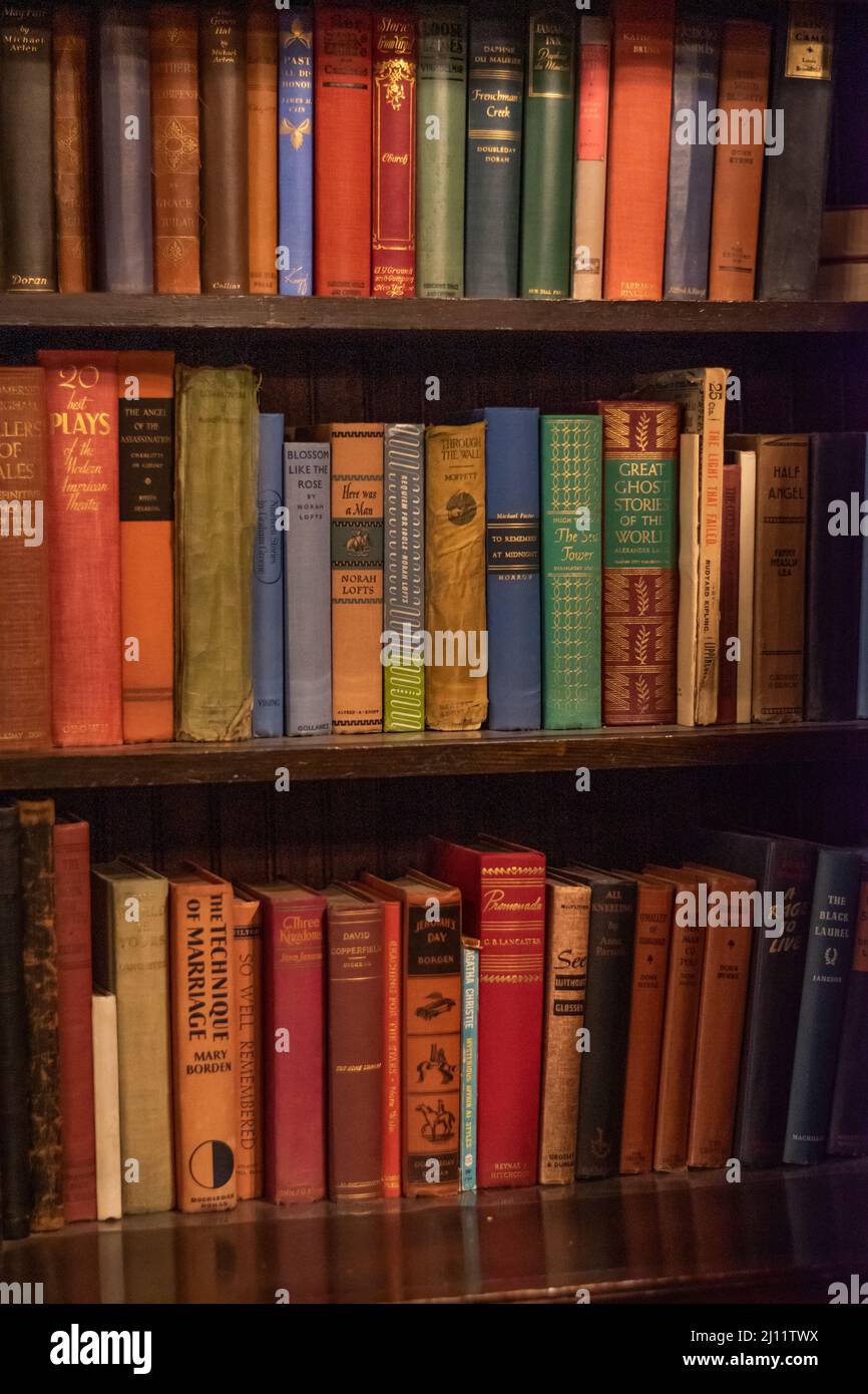 Old books on bookcase inside the Riordan Mansion in Flagstaff, Arizona, U.S.A. Stock Photo